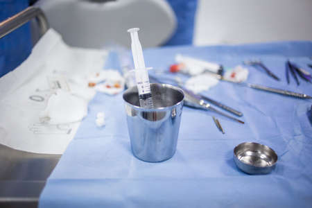Medical tray table with dental tools and equipment during teeth surgeryの写真素材
