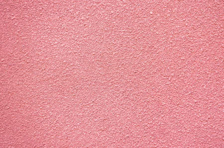 wall rough texture  pink color backgroundの写真素材