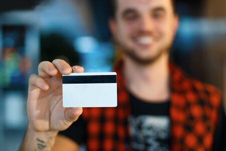 Man holding a payment cardの写真素材