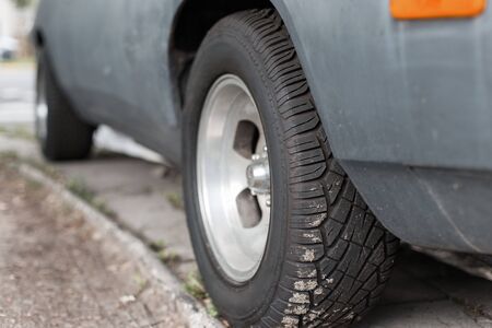 Car tire on old vintage automobile
