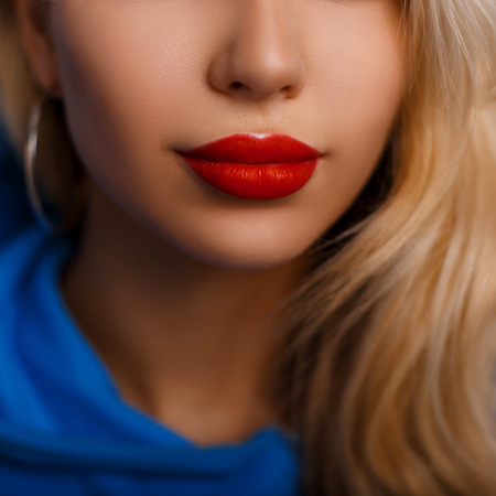 Beautiful red female lips. Fashion makeup close upの写真素材