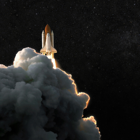 Spaceship rocket and starry sky. spacecraft flies into space with clouds of smoke