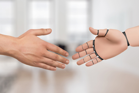 Hands of Robot and Human shake hands. Android. Artificial Intelligenceの写真素材