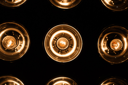 Bright electric orange vintage lamps. Close up