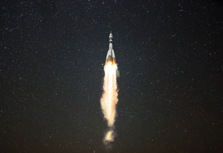 Concept of the launch of the spacecraft in the stellar space. Start concept. Rocket on a starry...