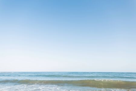 Seascape with ocean horizon and with clear blue sky. Sunny day. Background.