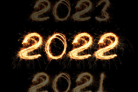 New Year's Eve 2022 of sparklers on a black background. Years Countingの写真素材