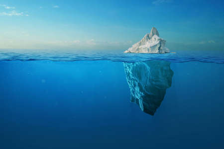 Iceberg With Above And Underwater View Taken In Greenland. Iceberg - Hidden Danger And Global Warming Concept. Iceberg illusion creative ideaの写真素材