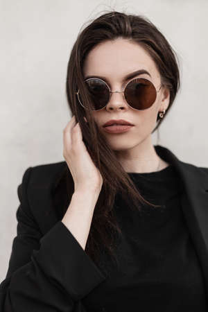 Fresh portrait modern young woman with brown hair with sexy lips with beautiful clean skin in...