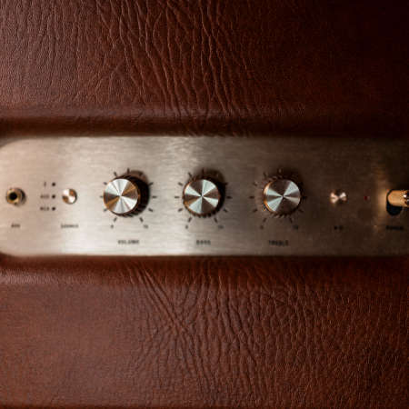 Vintage gold volume buttons with leather insert. audio deviceの写真素材