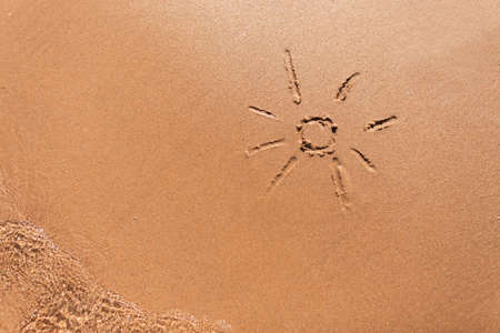 Sunshine sun above the sand. Picture of the sun on the beach. holiday concept. vacations. Rest and...