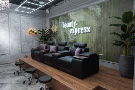 Beauty salon with interior and pedicure chairs