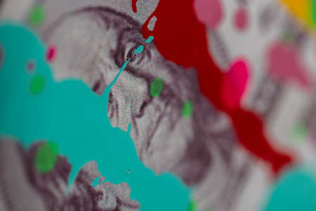 Art background of dollar with splashes of paints, closeup. Creative, money and economics concept ideaの写真素材