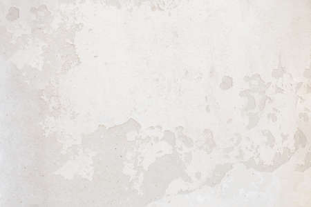 Vintage concrete texture with cracks and scratches. white wall