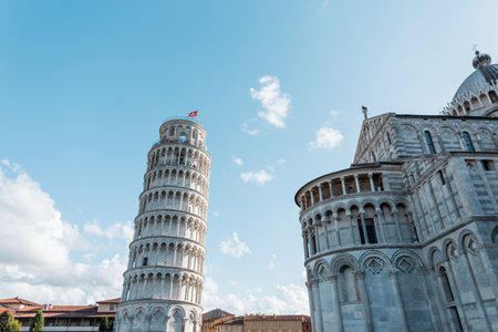 Beautiful amazing cathedral buildings with Romanesque architecture facades in the European town of Pisa, Italyの写真素材