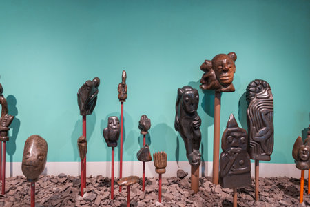 African stone statues on a green background. Culture and Art Africaのeditorial素材