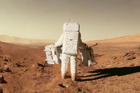 Spaceman astronaut in a space suit with equipment goes through the desert with stones and mountains on the red planet Mars. Colonization new planet concept. Journey to Mars, creative ideasの写真素材