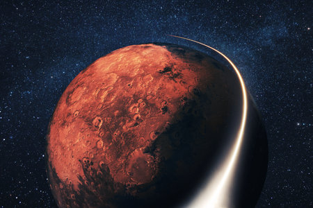 Space shuttle rocket flies with blasts and a light line around the red planet Mars with stars. Travel in space concept. Space satellite flies near the Mars. starry spaceの写真素材