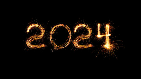 New Year 2024 light. Sparklers draw figures 2024. Bengal lights and letter. Holidays. Luxury