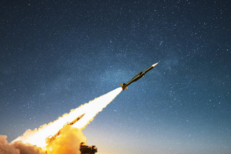 Nuclear missile with smoke and blast launching towards the target on the starry sky. Weapons, missiles rocket and war. Air defense, concept. Dangerの写真素材