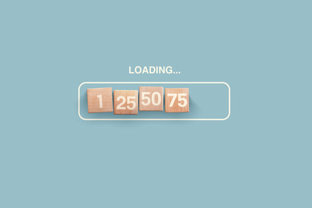 Loading with wooden cubes on blue background, creative idea. Development and update, concept. Loadの写真素材
