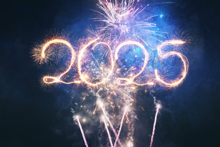 Happy New Year 2025 sparklers with golden fireworks on the night starry sky, creative idea. 2025 New...