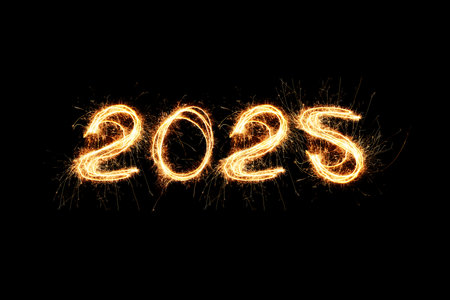 New Year 2025 light. Sparklers draw figures 2025. Bengal lights and letter. Holidays. Luxury Sparksの写真素材