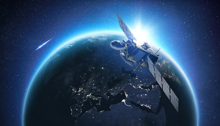 Amazing beautiful blue planet earth with satellite at sunset view from space. Horizon Earth with the lights of night cities. Communication and Telecommunications. Broadcasting.の素材