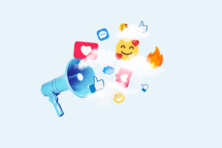 Creative loudspeaker with flying emoticons, likes, messages and reactions. Social media and affiliate marketing, concept. Traffic and sales online, creative idea.の写真素材