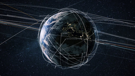 Beautiful blue planet Earth with satellites and trajectory lines in starry space. Planet Earth with the light of the night cities of Europe and the movement of the earth's satellitesの素材