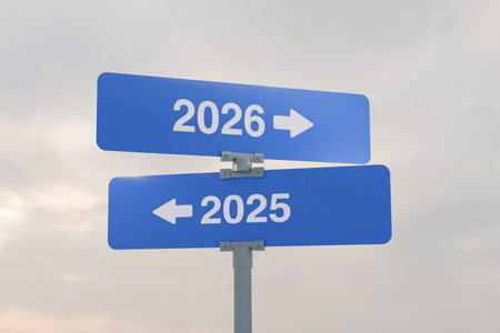 Road signs indicate the path to the new year 2026 and the old year 2025 on a gray sky, creative...