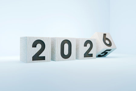 2026 growth business. wooden block with 2025 change to 2026, Set up objective target business cost and budget planning for new year concept. Turn of wooden cubes 2024 towards 2025 on blue backgroundの写真素材