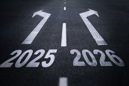 Road markings with arrows and years 2025 and 2026, symbolizing future direction, choice, planning, and decision-making for the upcoming years.の写真素材