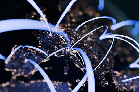 Planet Earth at night with glowing network lines connecting countries, symbolizing global communication, internet technology, data exchange, and worldwide digital connections.の写真素材