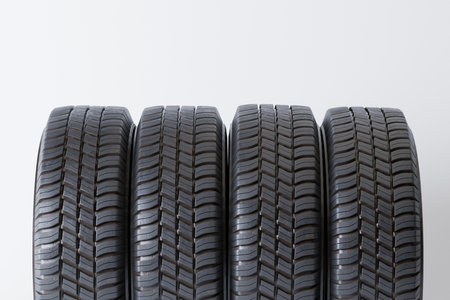 Close-Up Of Tires Against White Background. Car tires, winter wheels isolatedの写真素材