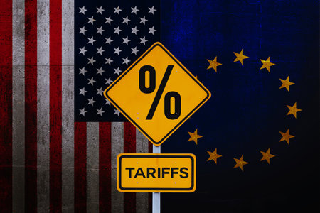 Tariffs and Sanctions between United States and the European Union. Crisis, concept. Yellow road sign tariffsの写真素材