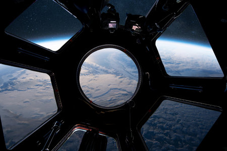 View of Earth from space through the window of a spacecraft or space station. Stunning orbital perspective showing clouds, continents, and the curvature of the planet. Elements of exploration, scienceの写真素材