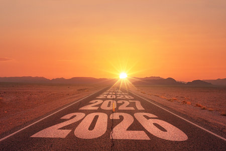 New year 2026. Straight road in desert with years 2026 to 2030 marked on the asphalt, leading toward...