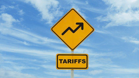 Road yellow sign Tariff increase on blue sky with clouds, creative idea. Trade war and duties, taxes increase, concept. World crisis. USA tariffs on EU. Crisis, economicの写真素材