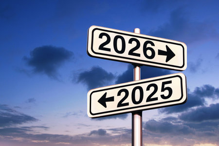 Road signs indicate the path to the new year 2026 and the old year 2025 on a blue sky, creative idea. Choose a new road, concept. Change for the betterの写真素材