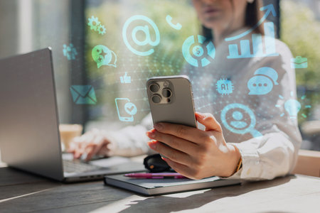 Businesswoman using smartphone and laptop at desk, surrounded by digital marketing and AI icons....