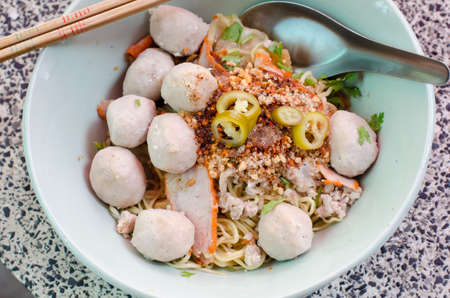 in thailand we can order the special noodles by adding the money to get the more meat ballの写真素材