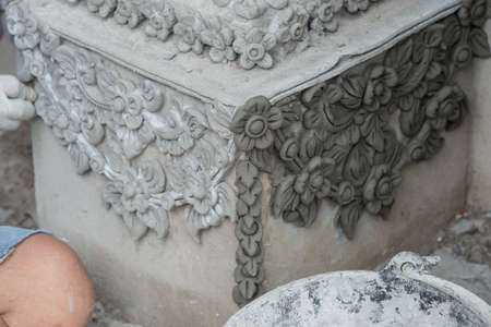 Molding and Sculpting on the entrance construction at Wat Sanpayang Luang, Lamphun, Thailandの写真素材