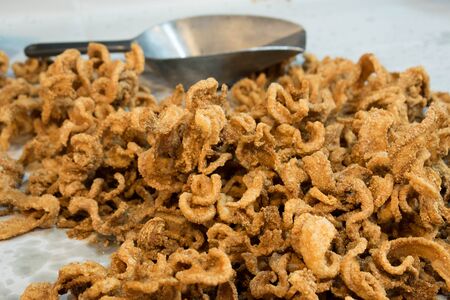 Crispy pork skin  on Oil-blot sheet paperの写真素材