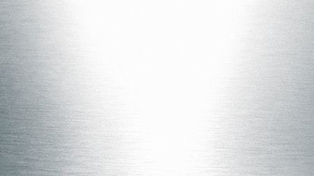 Metal background or texture of brushed steel plate with reflections Iron plate and shinyの写真素材