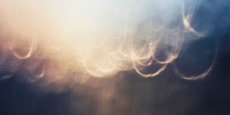 abstract blurred background with bokeh defocused lights and shadowの写真素材