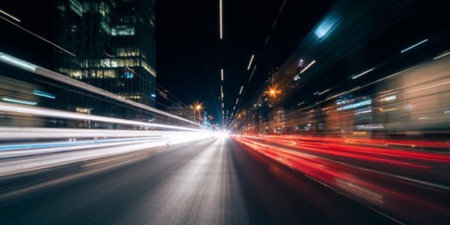 Motion blur of car in city at night. Motion blur of car in city at night.