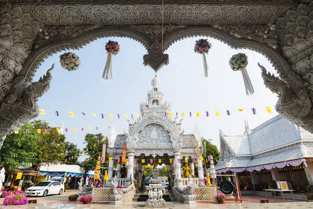 NAN ,THAILAND - APRIL 14 : Songkran festival at City pillar, Wat ming myang on April 14, 2014 in Nan, Thailand.のeditorial素材
