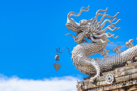 Dragon sitting on the roof, Chiangmai, Thailandの写真素材