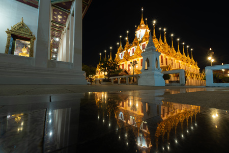 Reflection of Wat Ratchanatdaram and Loha Prasat Metal Castle (Bangkok ,Thailand)のeditorial素材